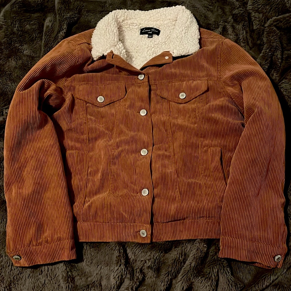 Love tree fur inside jacket size large fits like a medium